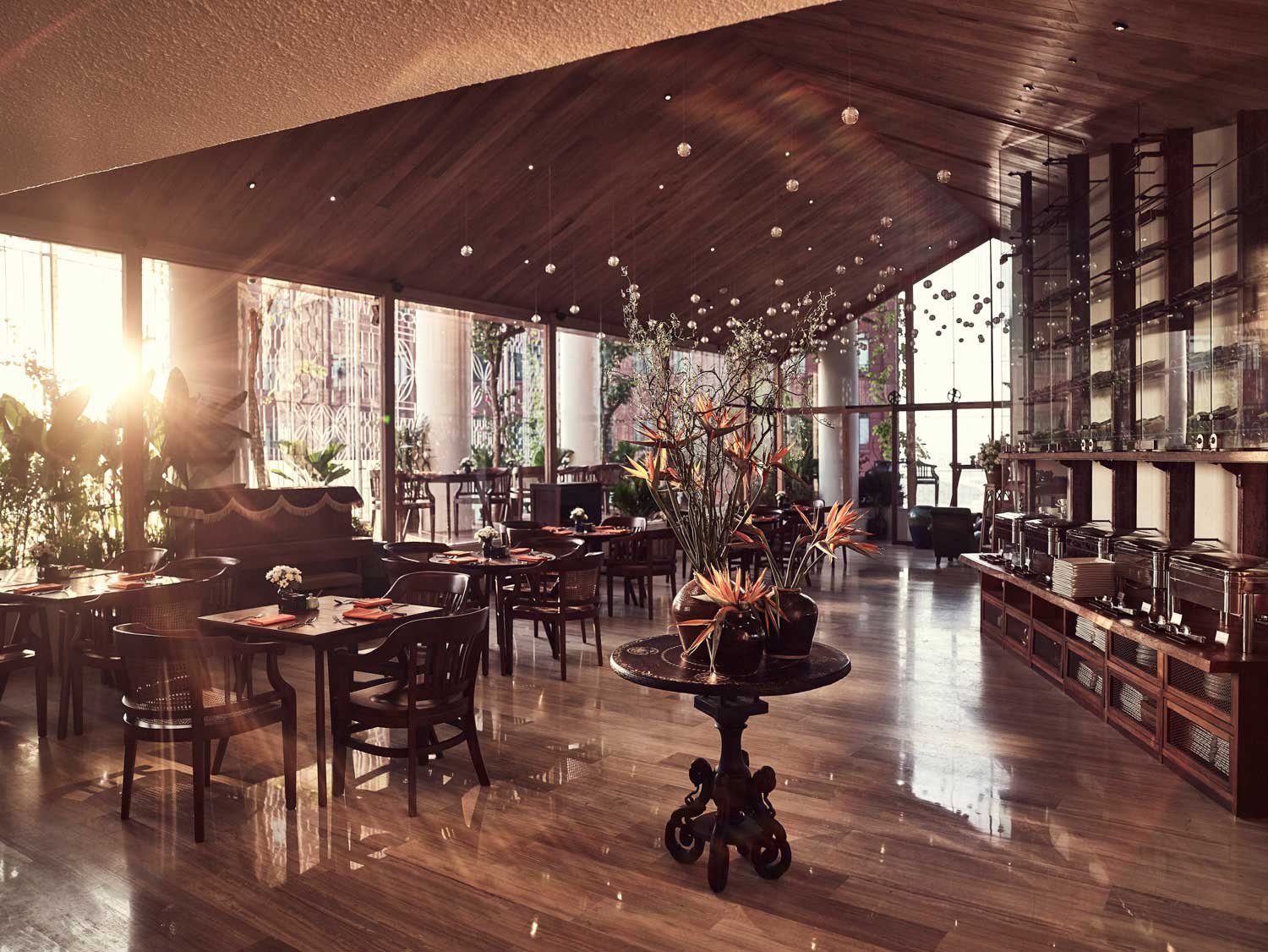 Hotel Breakfast Buffet in Saigon: Why It Is So Loved 2 The Nest on the twelfth floor with its wooden buffet counter and morning light over the city