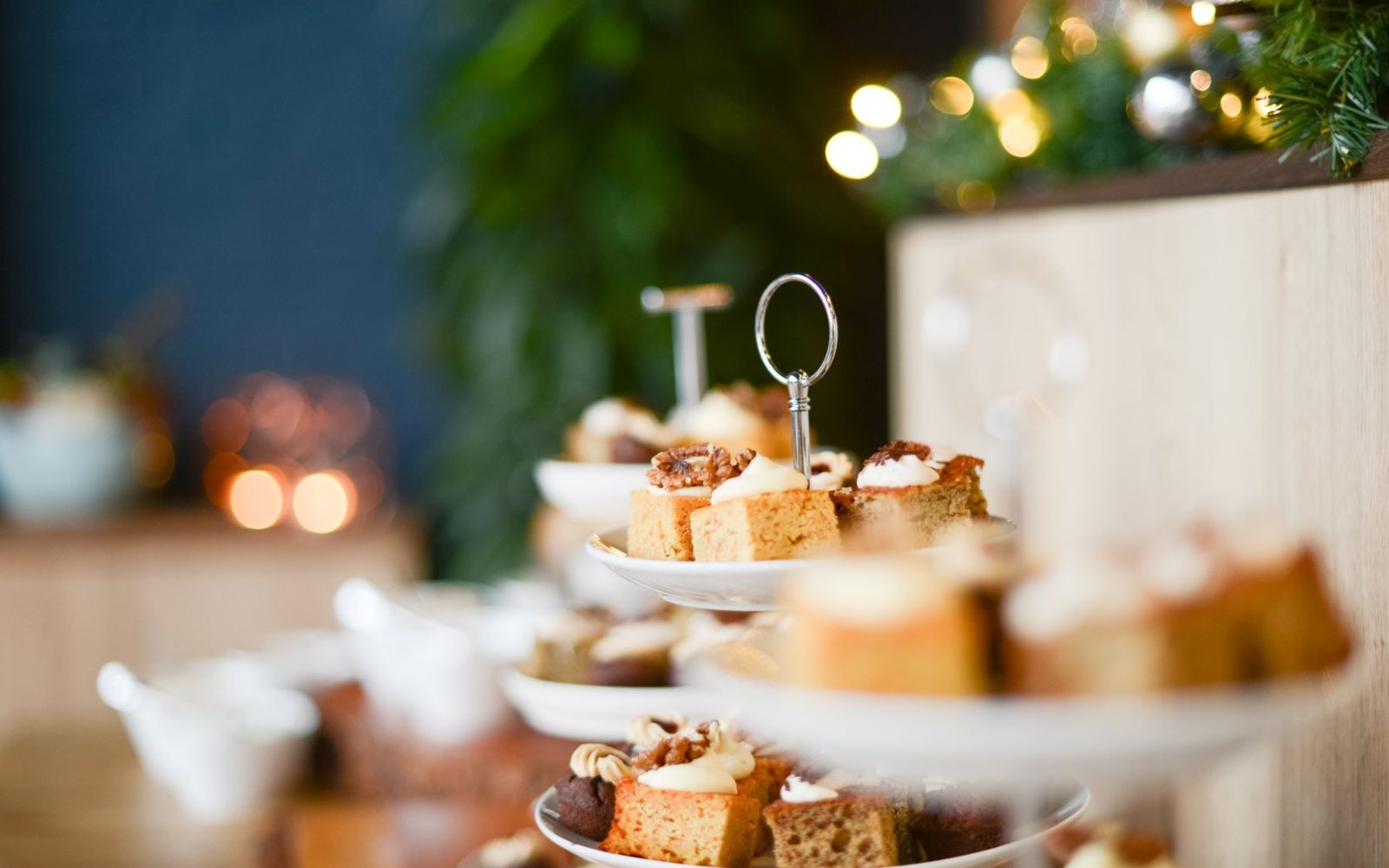 Christmas Afternoon Tea in Central Saigon: A Festive Ritual in District 1 1 Festive afternoon tea stand with seasonal pastries and warm December light