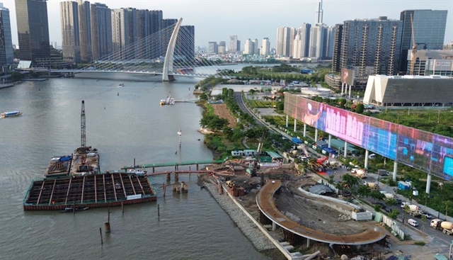 Saigon's New Pedestrian Bridge: The Coconut-Leaf River Icon 2 thu thiem pedestrian bridge